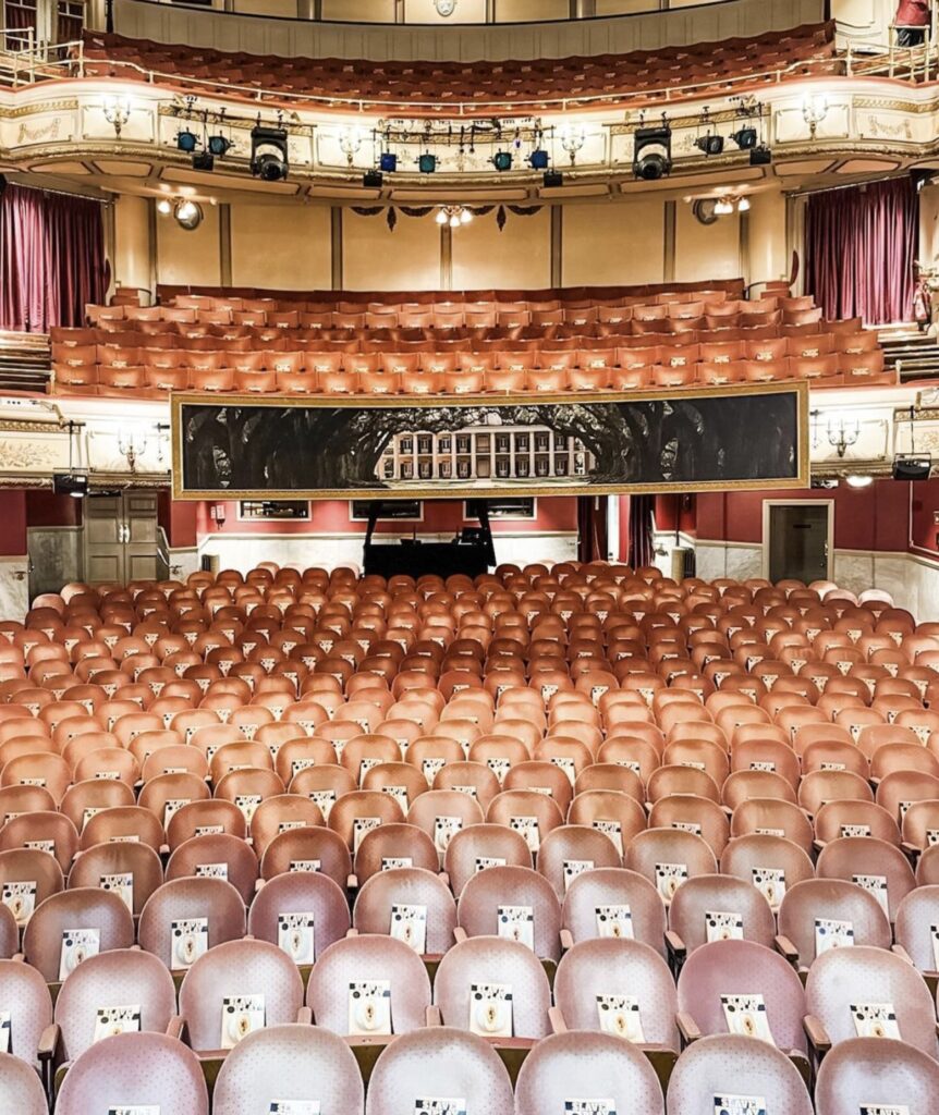 An empty theater full of Playbills advertising 'Slave Play'